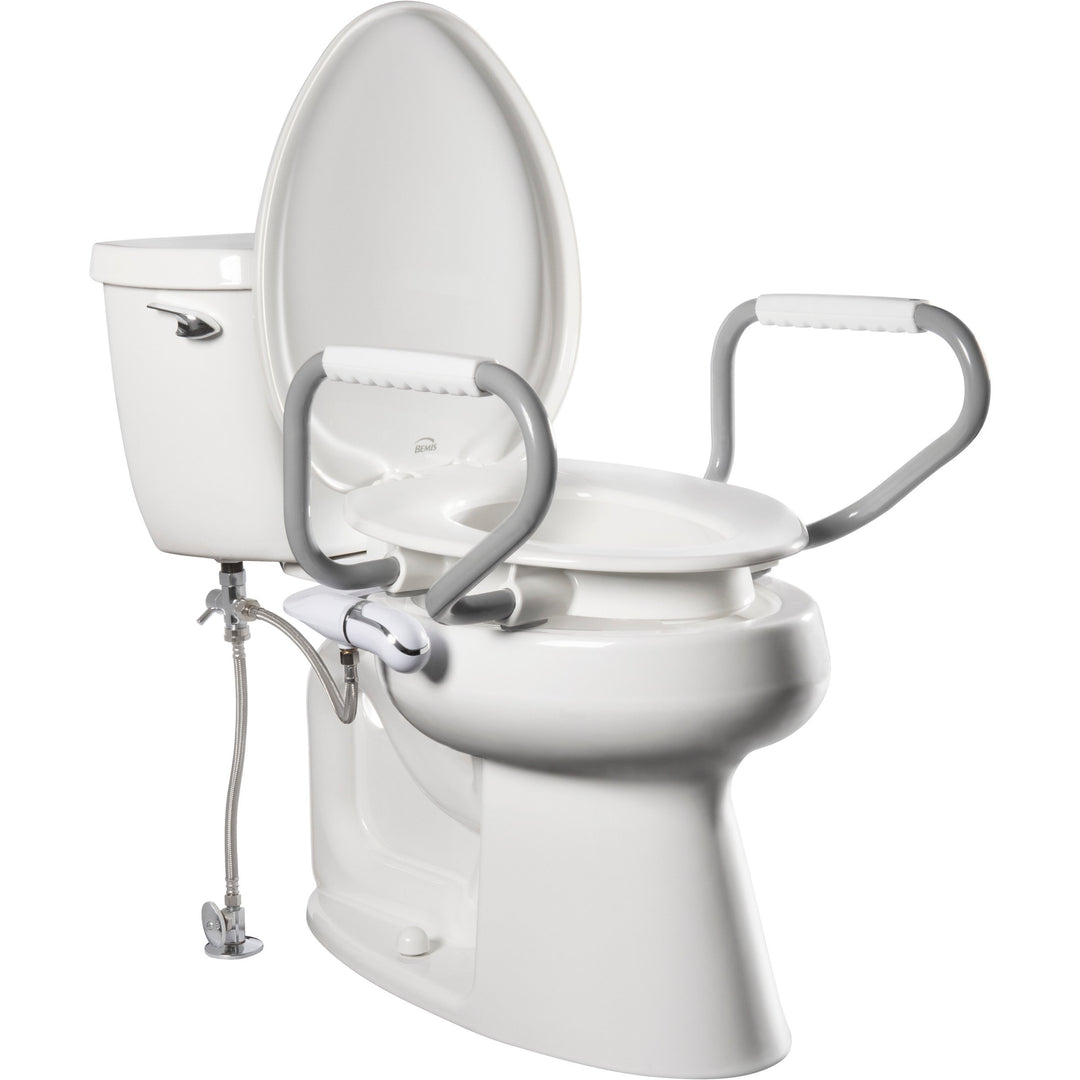 E/R85320H20 ARM Bemis Independence Assurance® with Clean·Shield™, Support Arms, and Personal Wash Bidet is a Plastic 3" Raised Toilet Seat Featuring Stay·Tite® Commercial Fastening System™ and Super·Grip® Bumpers